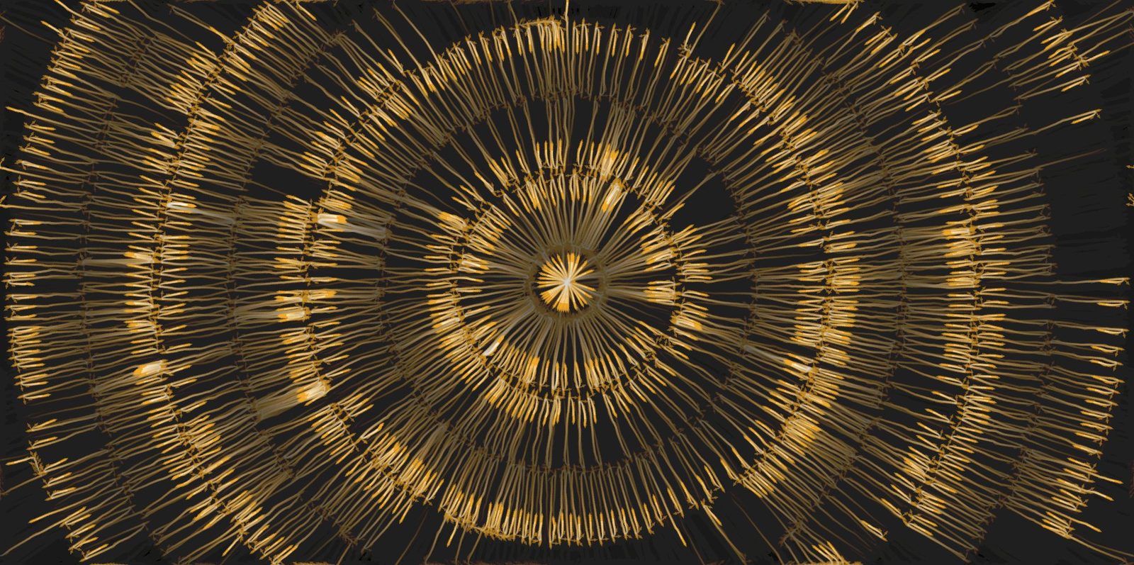 Radial gold field expanding from a coherent centre